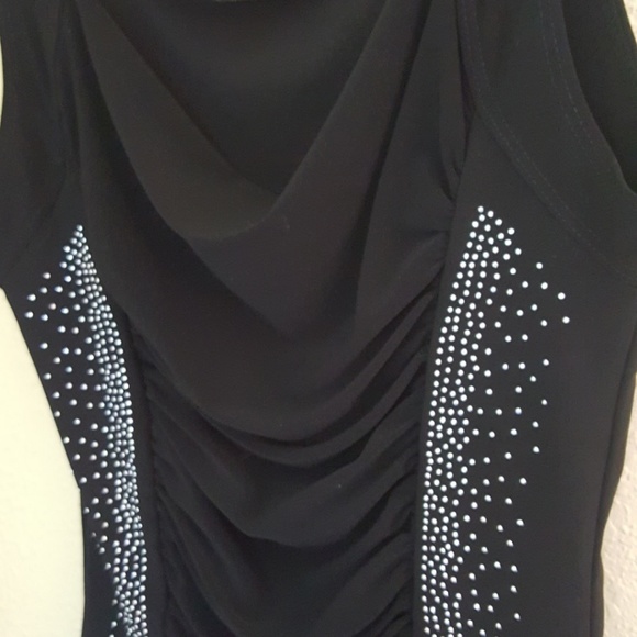 Sleeveless  black top. - Picture 2 of 3